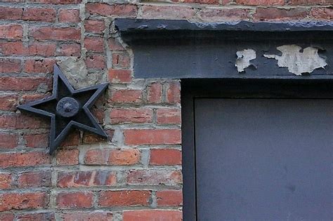 metal star in front of house meaning|metal stars on old buildings.